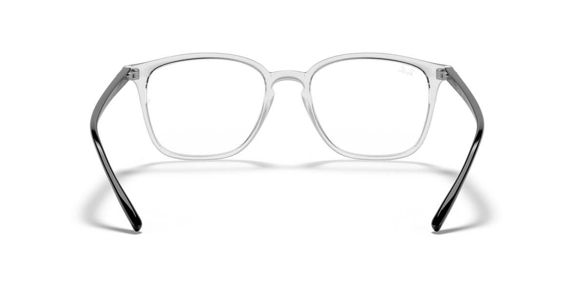 Prescription eyewear frames, clear dark gray translucent front view with thick bridge