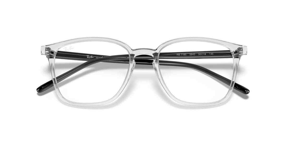 Prescription eyewear frames, clear dark gray translucent front view with smooth temples