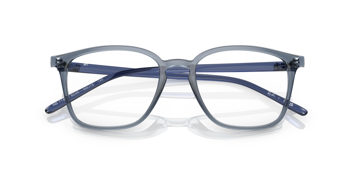 Blue transparent prescription eyewear frames front view, clear lenses, metal detailing
