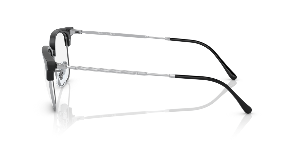 Black eyeglass frames with clear lenses, side profile view