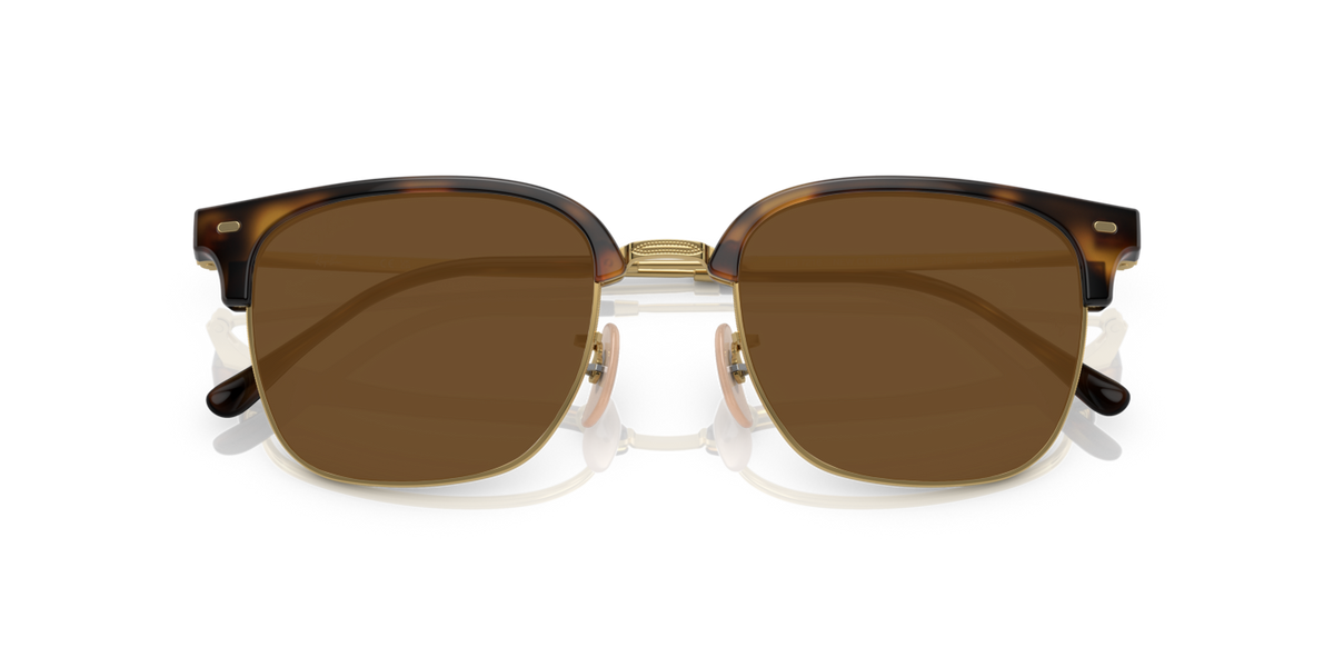 Brown tortoise eyeglass frames with clear lenses, front view