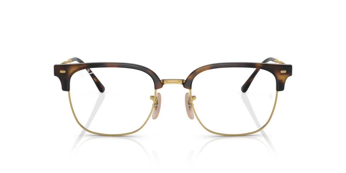 Brown tortoise eyeglass frames with clear lenses, straight front view