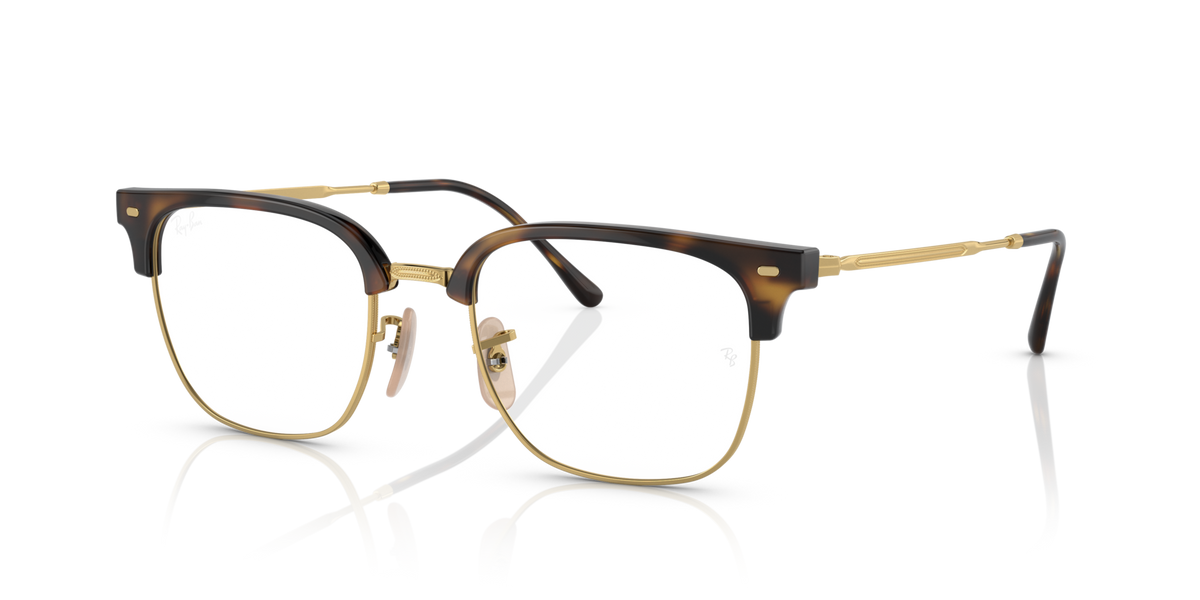 Brown tortoise eyeglass frames with clear lenses, angled front view