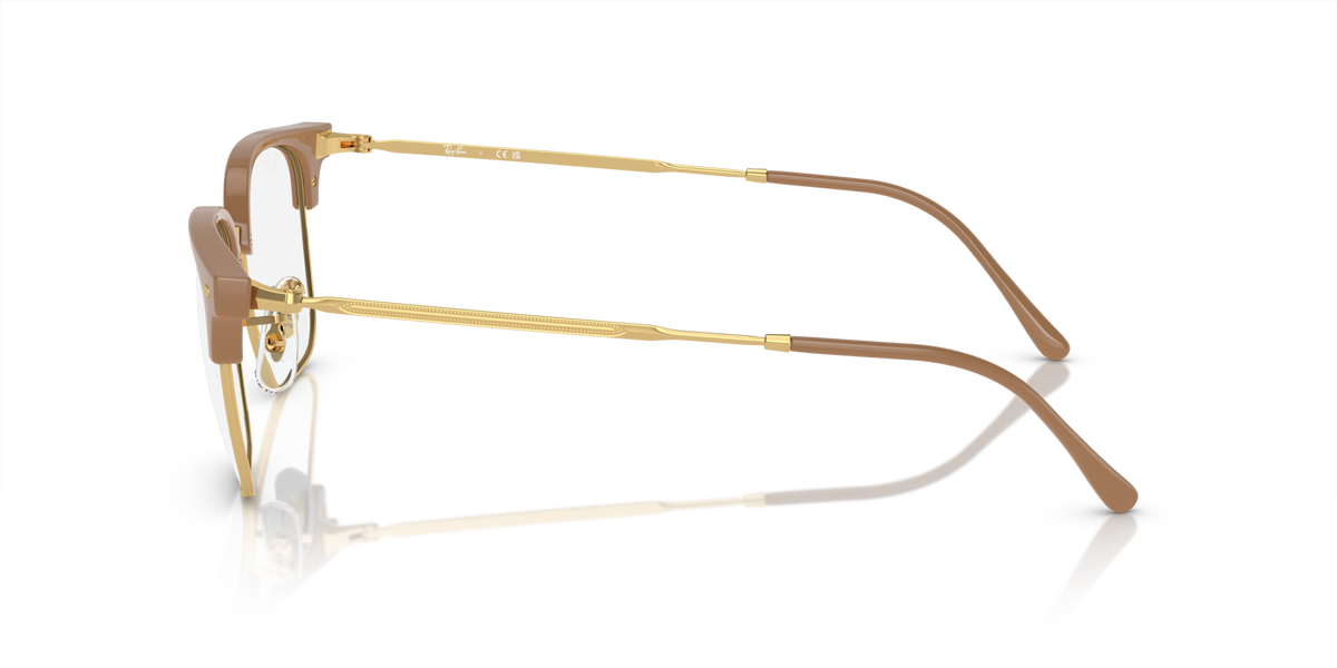 Havana brown and gold metal eyeglass frames, angled side profile