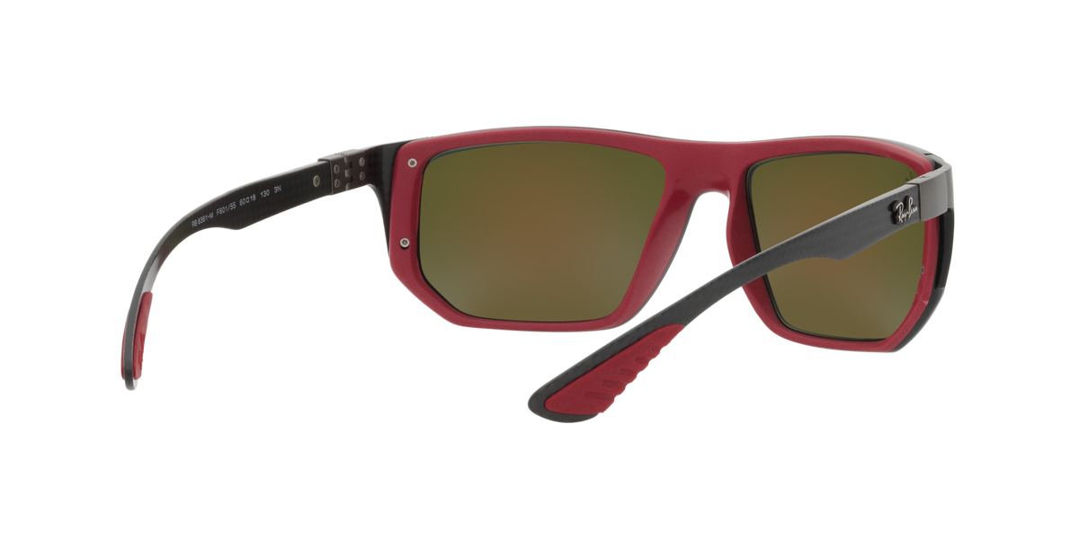 Ray-Ban sunglasses with red frame and olive mirrored lenses, side profile view