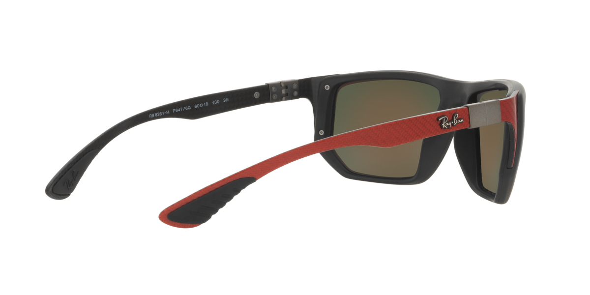 Sunglasses with dark frame, brown lenses, and red Ray-Ban temple stripe