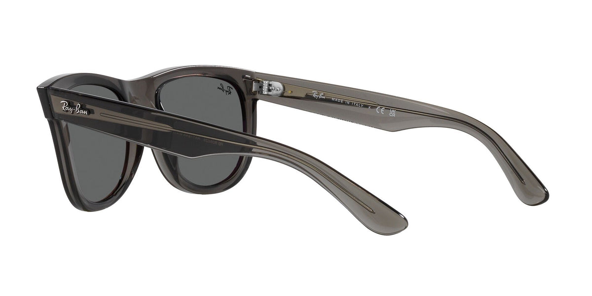 Wayfarer Reverse sunglasses, transparent smoke frame with dark lenses, angled side view