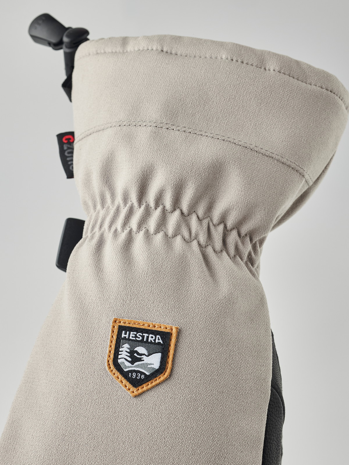 Hestra CZone Mountain mittens in beige with stitched Hestra logo patch