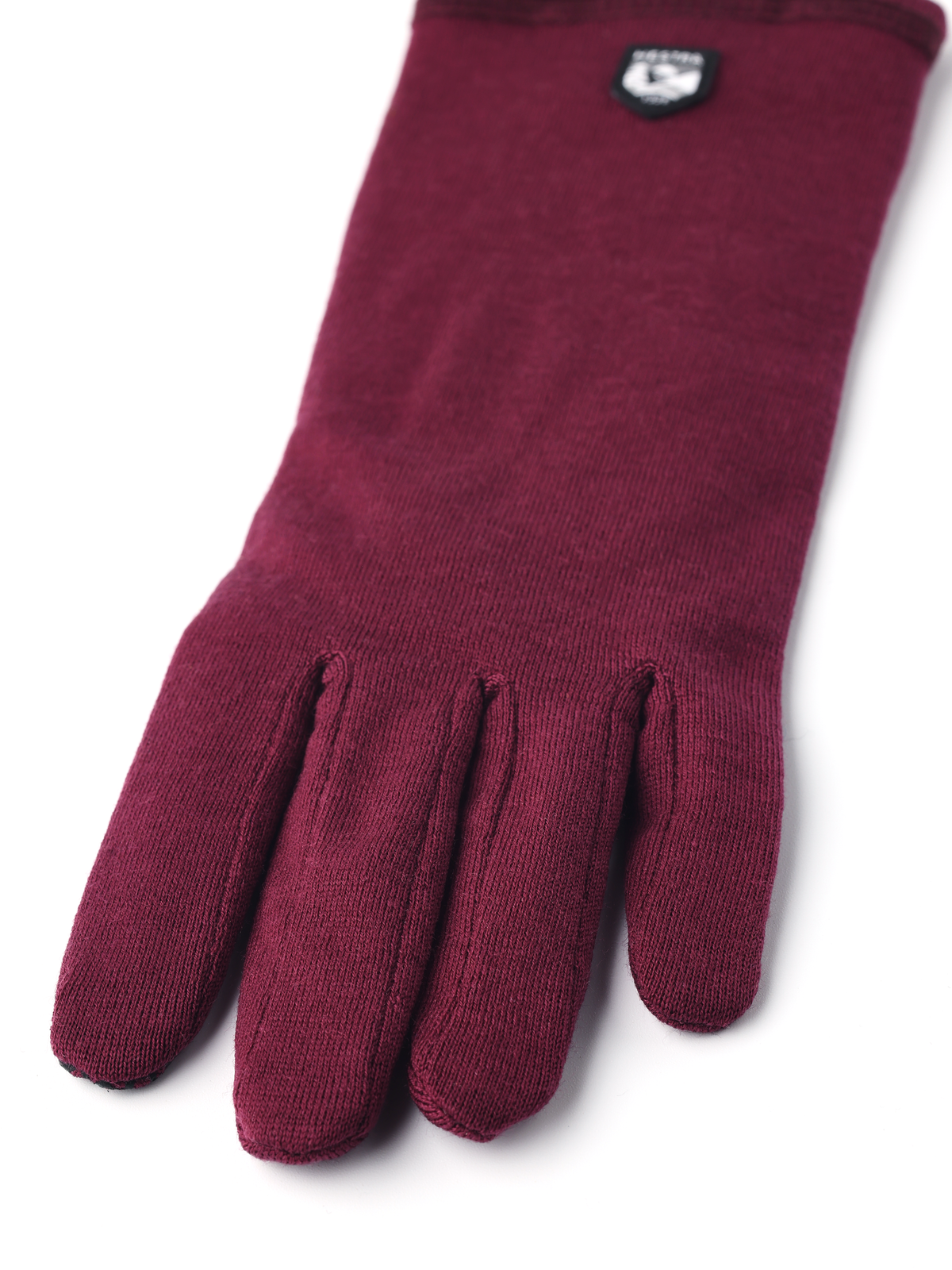 Bordeaux merino wool long glove liners with five-finger design and small logo patch