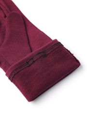 Bordeaux merino wool glove liners with ribbed cuff trim and folded sleeve edge