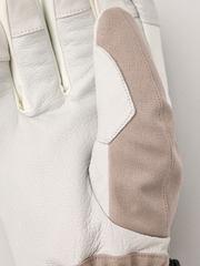 Close-up powder gauntlet gloves: beige fabric with white leather panel and stitching