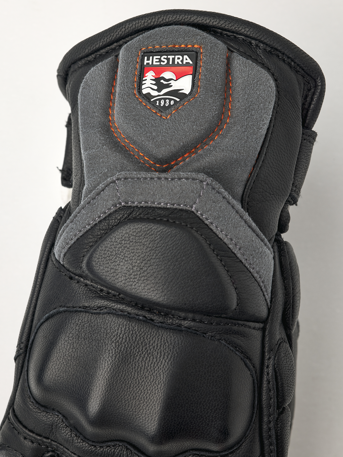 Hestra Impact Racing junior gloves, black leather palm with HESTRA patch and orange trim
