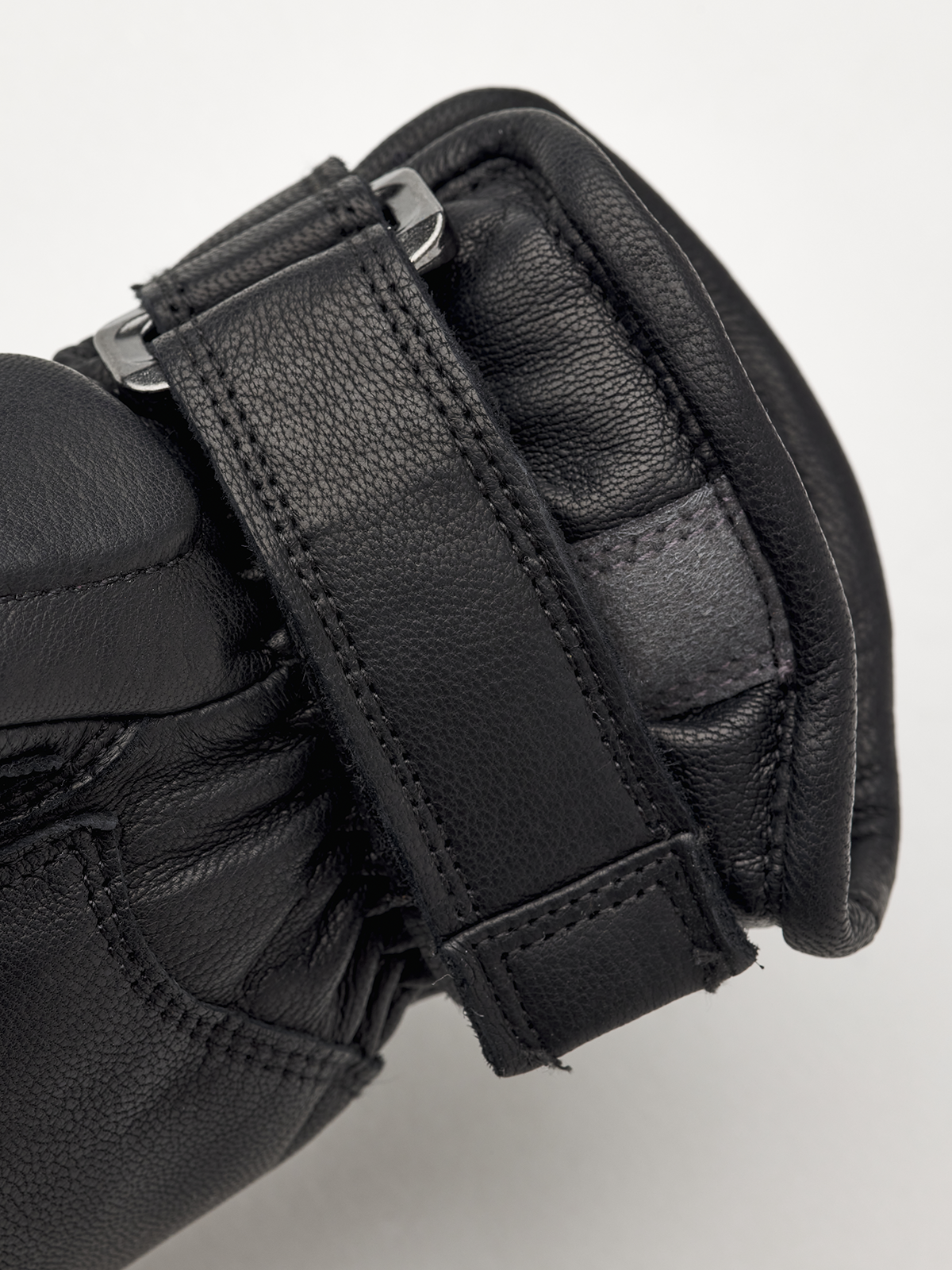 Hestra Impact Racing junior gloves, black wrist cuff with adjustable strap and metal buckle