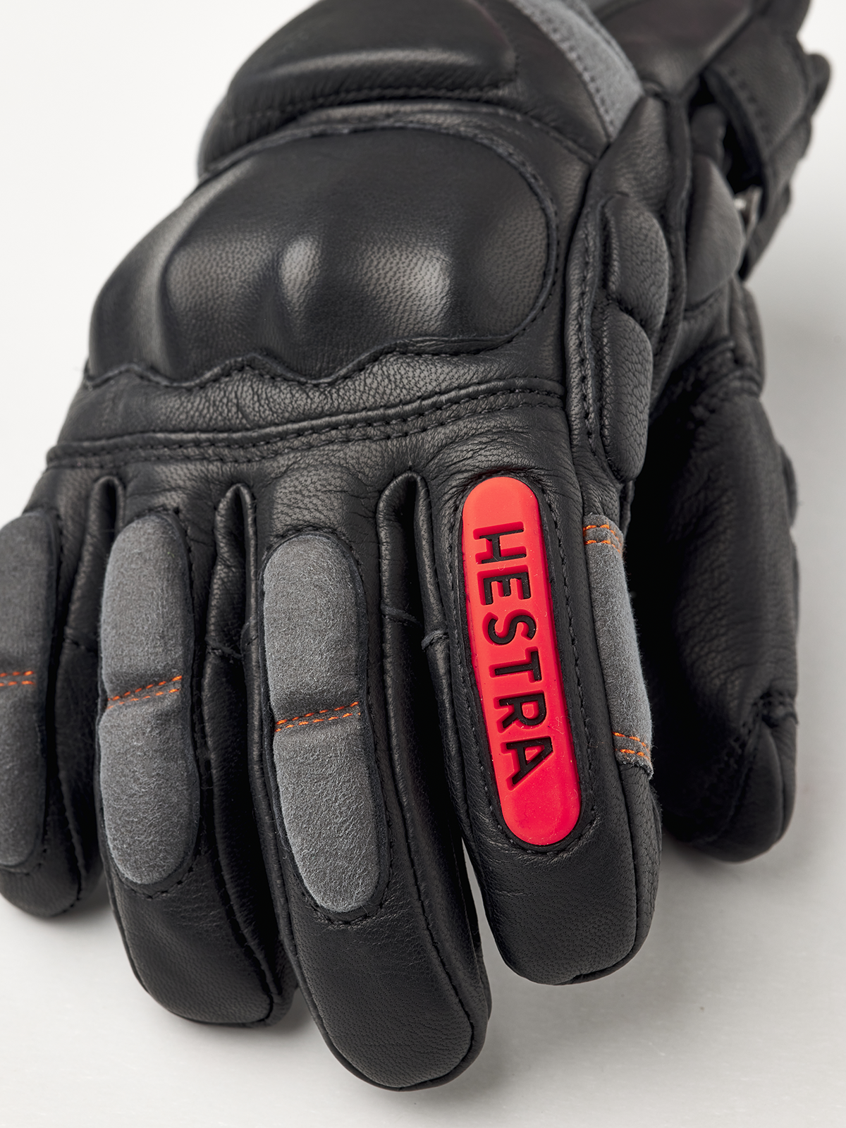 Hestra Impact Racing junior gloves, black with red HESTRA logo and orange stitching