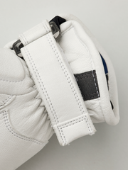 Kids racing gloves cuff detail, white leather strap with black patch and stitched edges