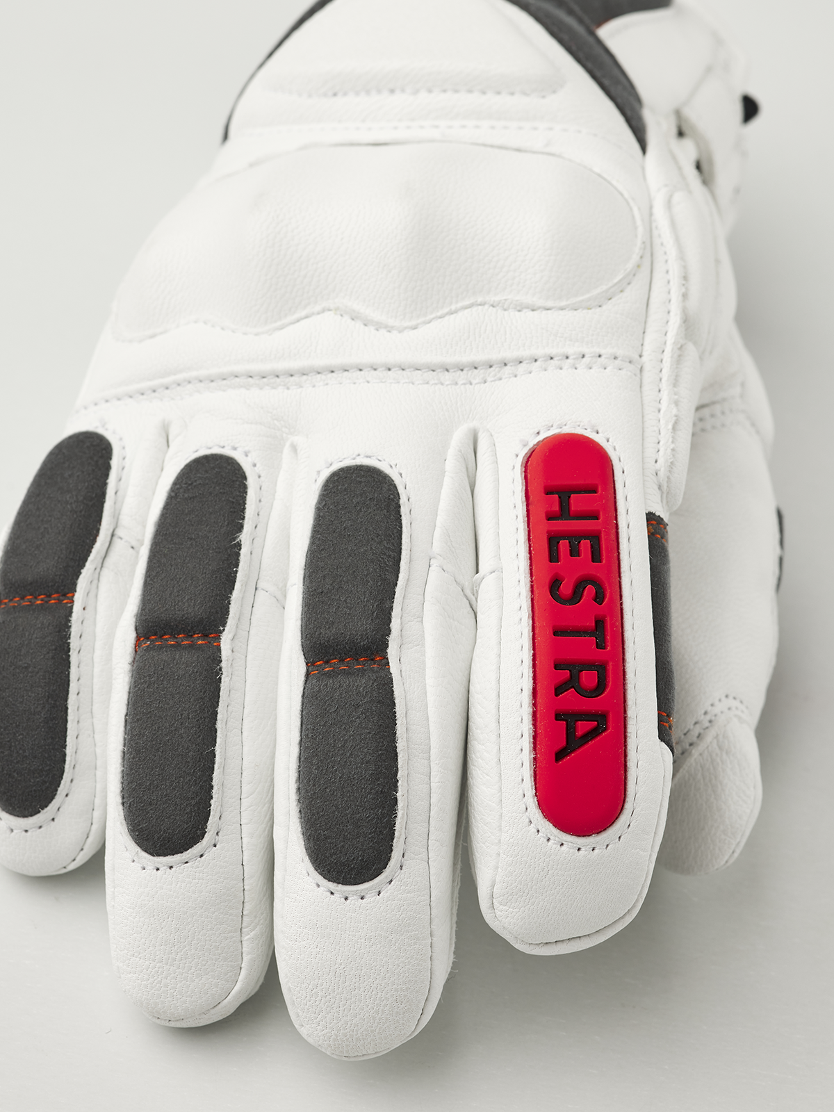 Hestra Impact Racing SR glove, white palm with red Hestra logo patch and gray inserts