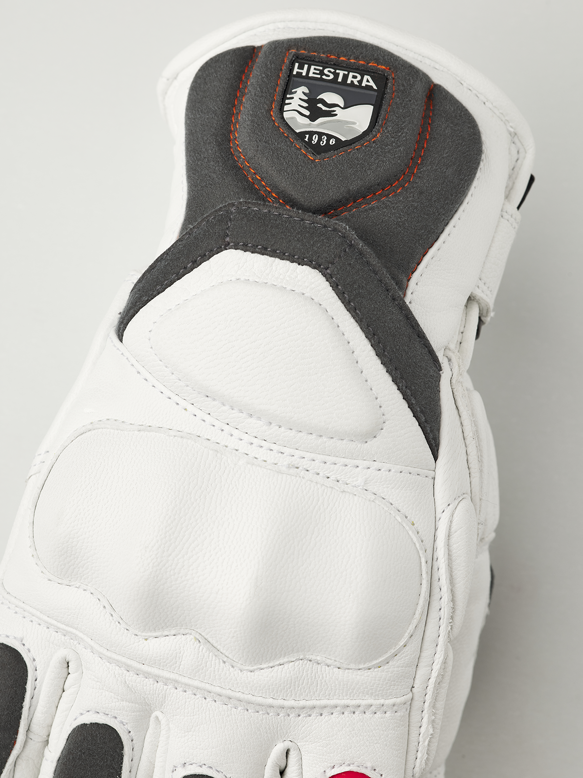 Hestra Impact Racing SR glove top view, white leather with gray panels and Hestra patch