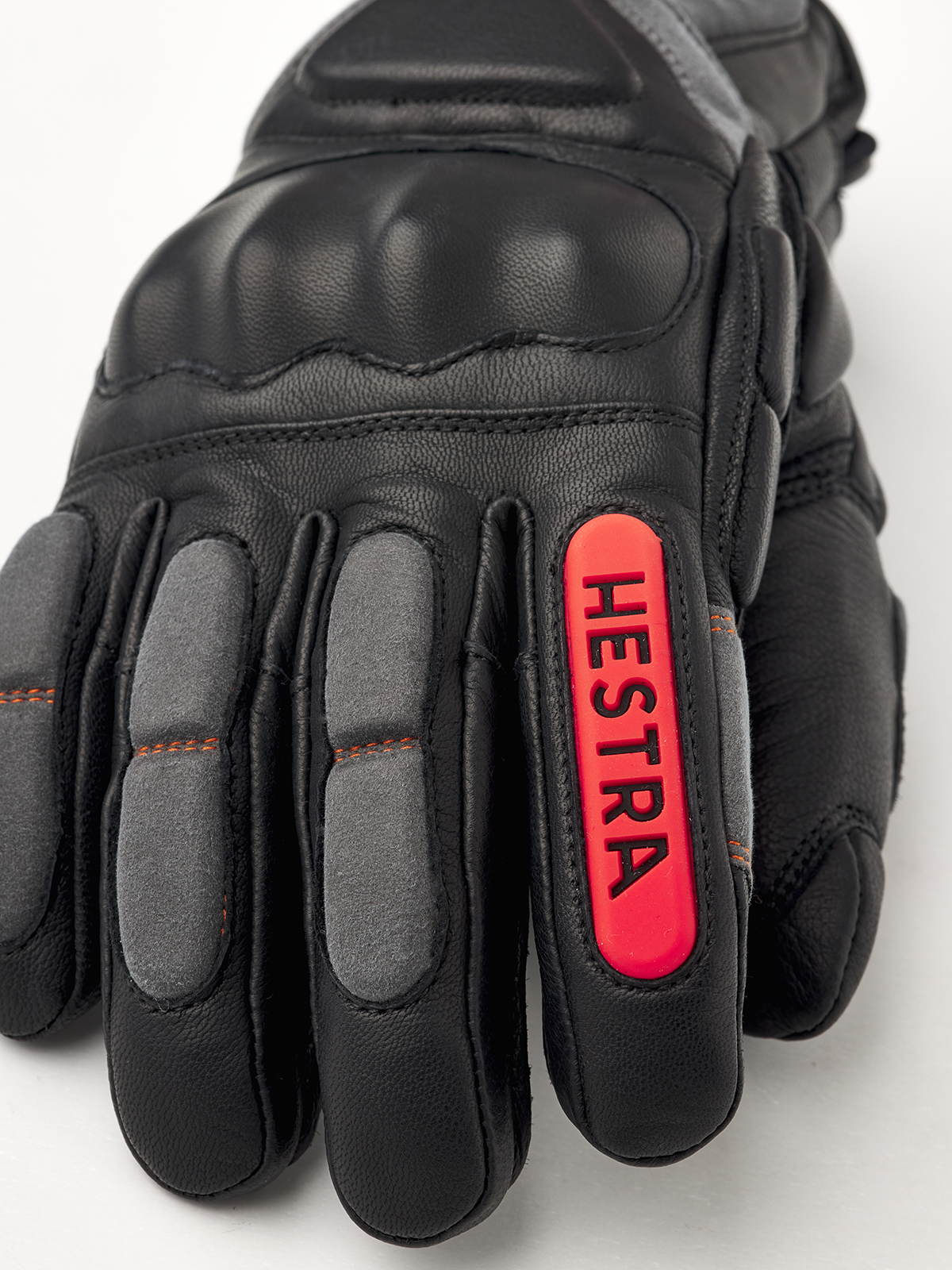 Hestra Impact Racing SR glove, black palm with red Hestra logo patch and finger padding