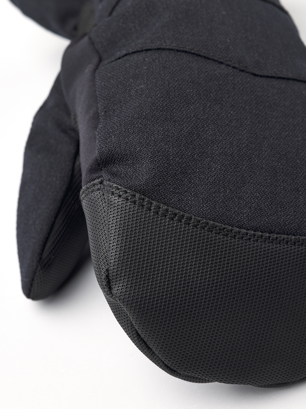 Black junior ski mitt with textured palm panel and dark wrist cuff