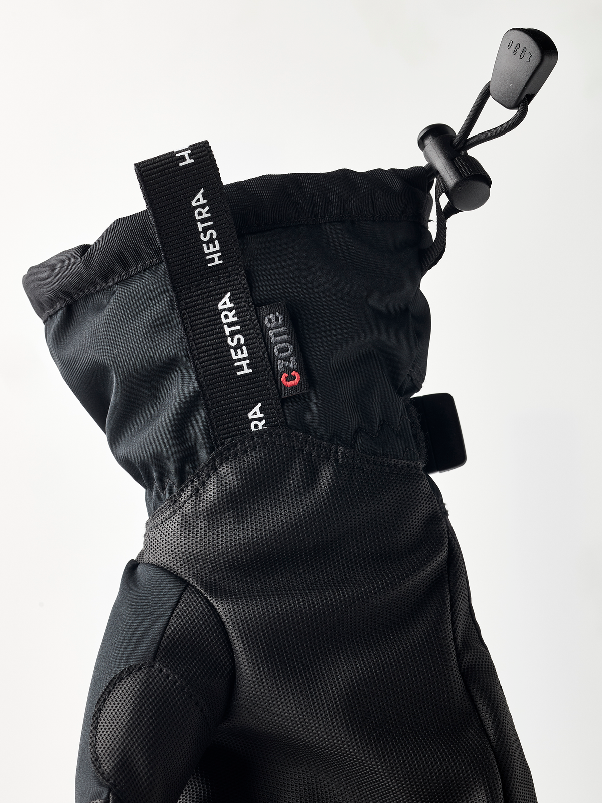 Kids dark 3-finger gauntlet gloves with textured palm and wrist strap details