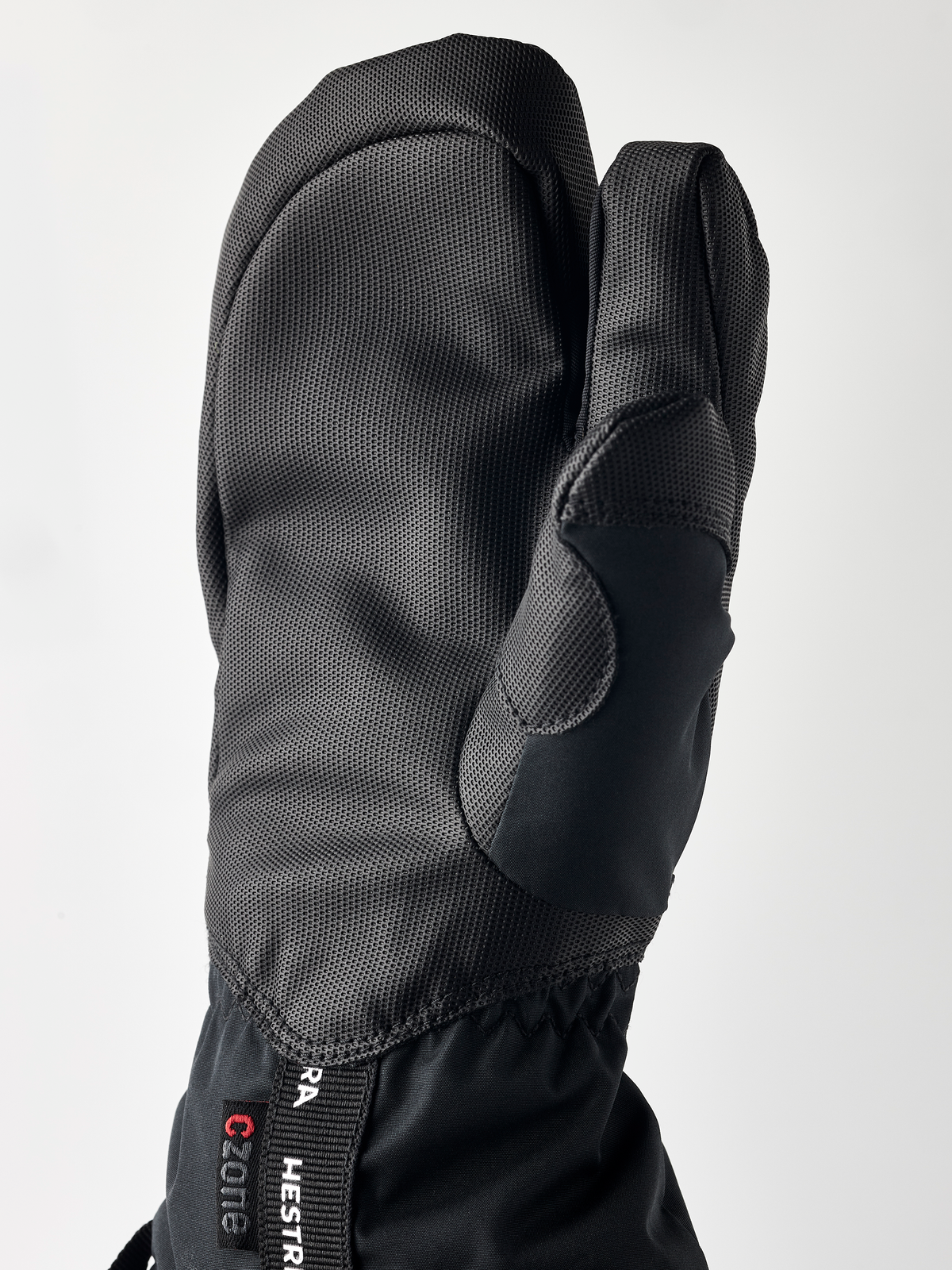 Hestra Gauntlet CZone Jr 3-finger gloves in dark grey/black, textured knuckle panel