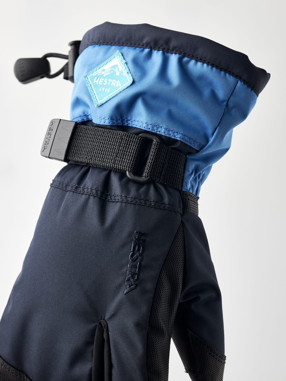 Hestra Gauntlet CZone Jr 3-finger gloves with sky blue top cuff and dark navy palm