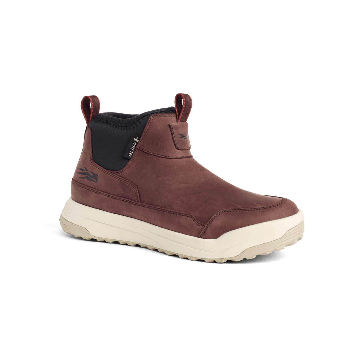 Brown suede mid boot with dark inner panel, ankle pull tabs, and white tread sole