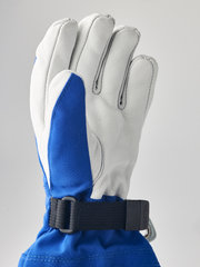 Kids ski gloves in white and royal blue with elastic wrist cuff strap