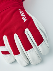 Kids ski gloves in red with white leather palms and white HESTRA logo