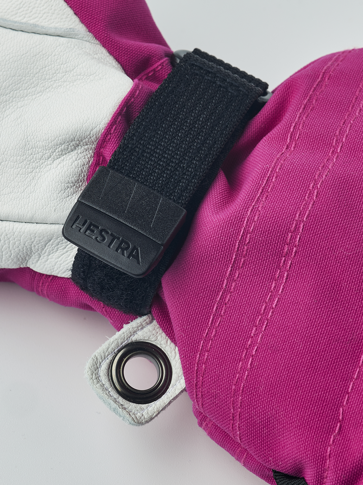 Pink ski junior glove wrist strap buckle with metal ring pull tab