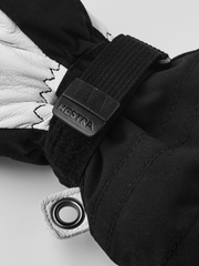 Black junior ski gloves with leather palm and black Hestra wrist strap