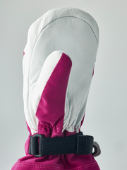 Kids ski mittens with white leather palm, bright magenta back, and black wrist strap
