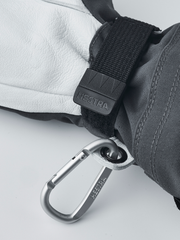 Hestra junior ski gloves in dark gray with black wrist strap and carabiner key-ring clip