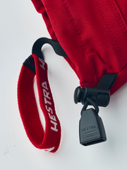 Hestra junior ski mittens in red with black lace loop and hanging strap detail
