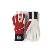 Pair of comfort tracker gloves: red glove left, off-white glove right with black cuff