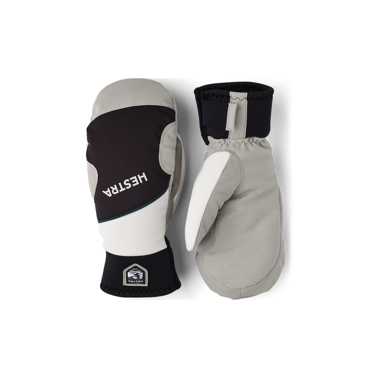 Hestra comfort tracker mittens in black with off-white accents and wrist strap