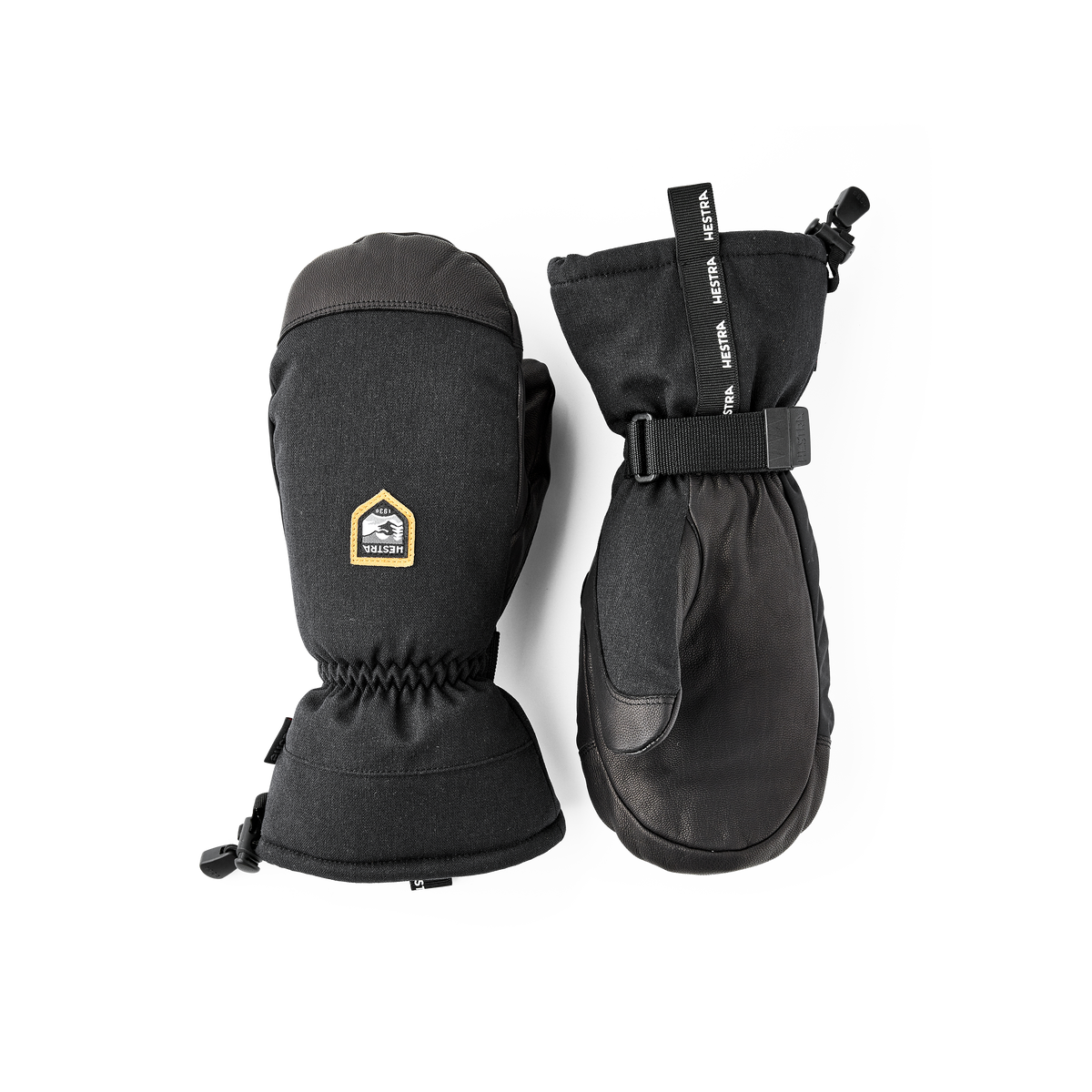 Pair of black mountain mittens with wrist strap and HESTRA logo patch