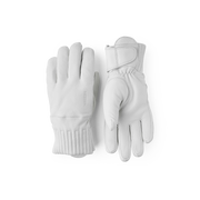 White leather gloves with ribbed knit cuffs and stitched finger panels