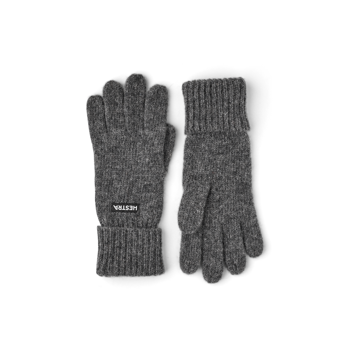Grey knit glove liners with Hestra logo patch, fingerless-style coverage