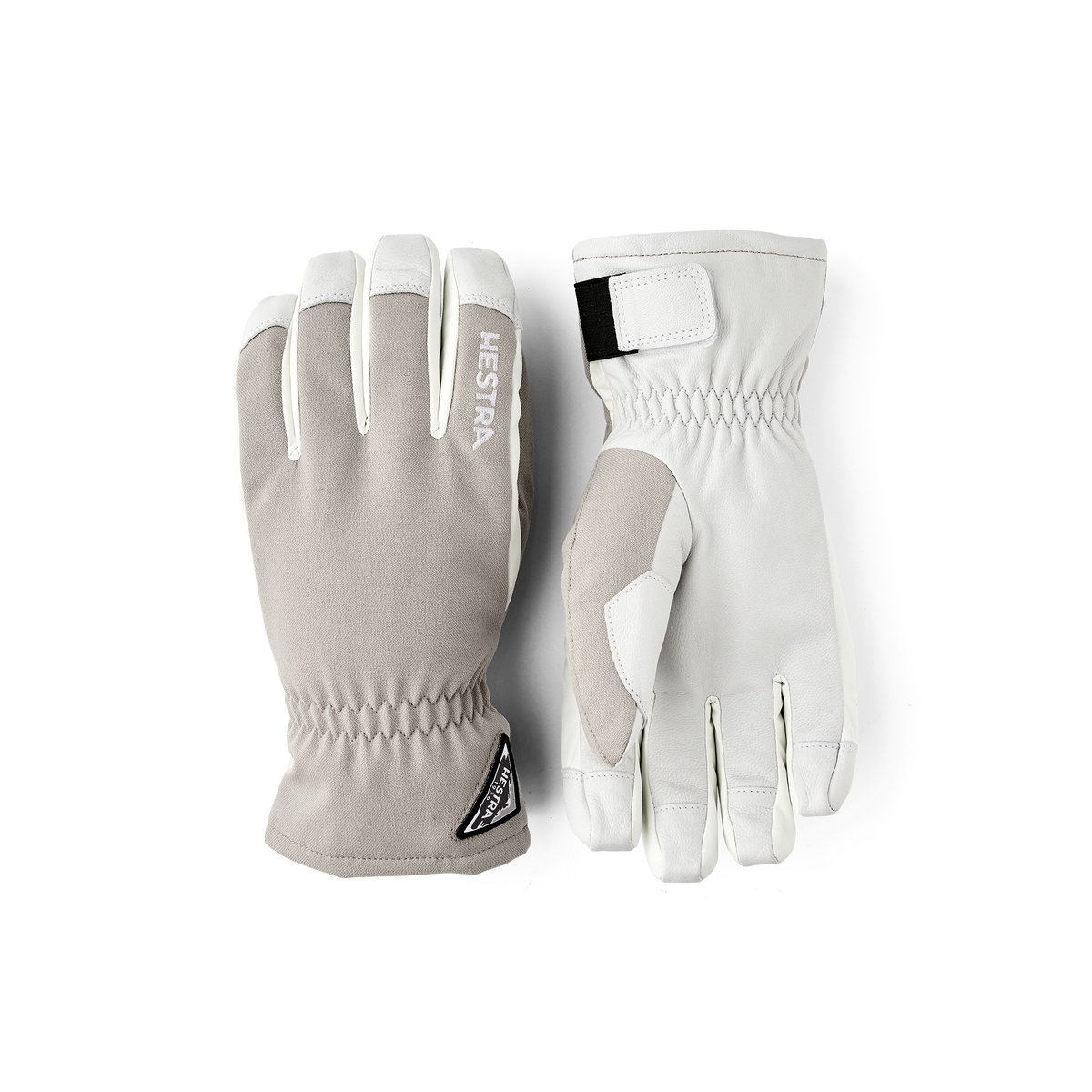 Beige and white short winter gloves with Hestra logo patch