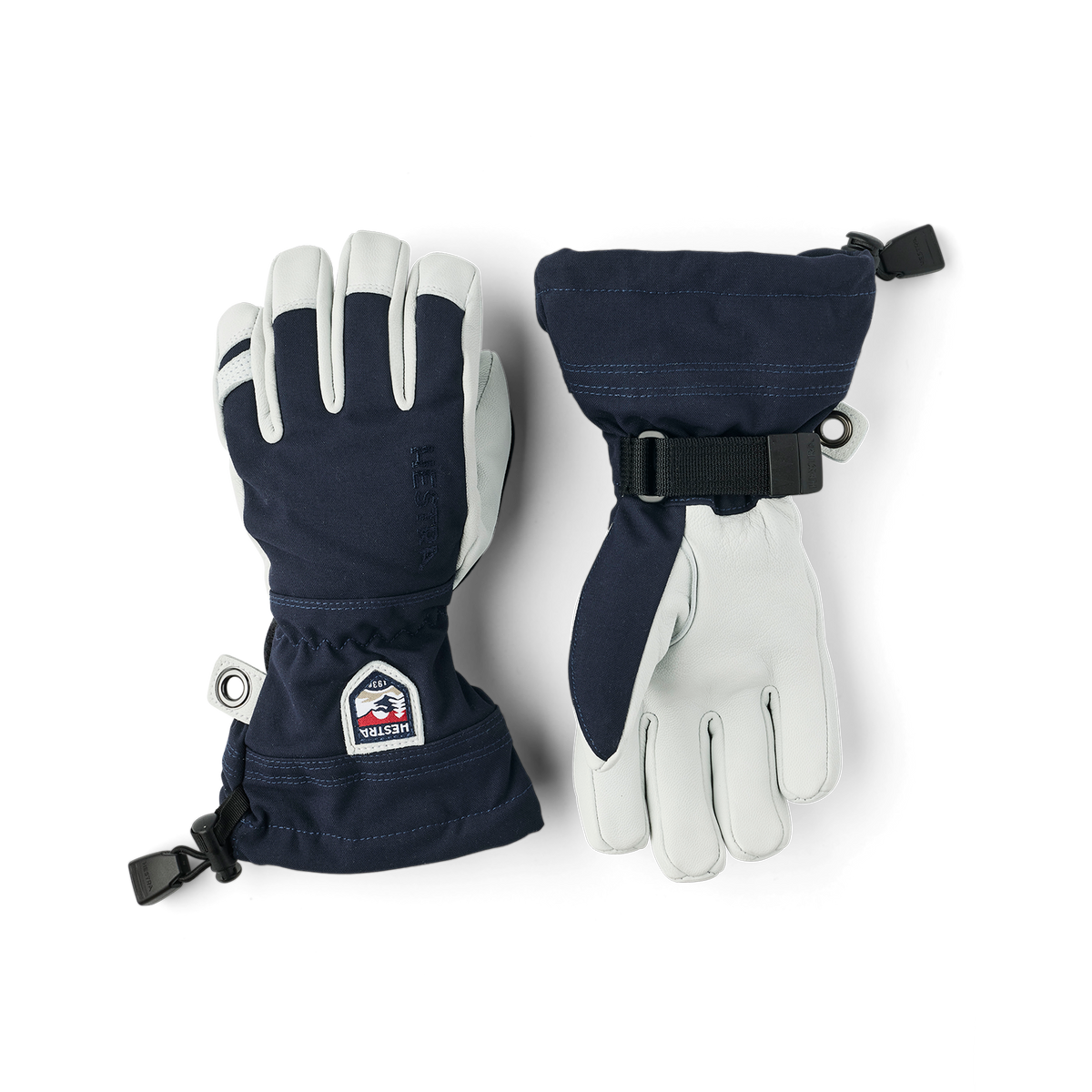 Kids navy and white ski gloves with wrist strap, logo patch, and grommet