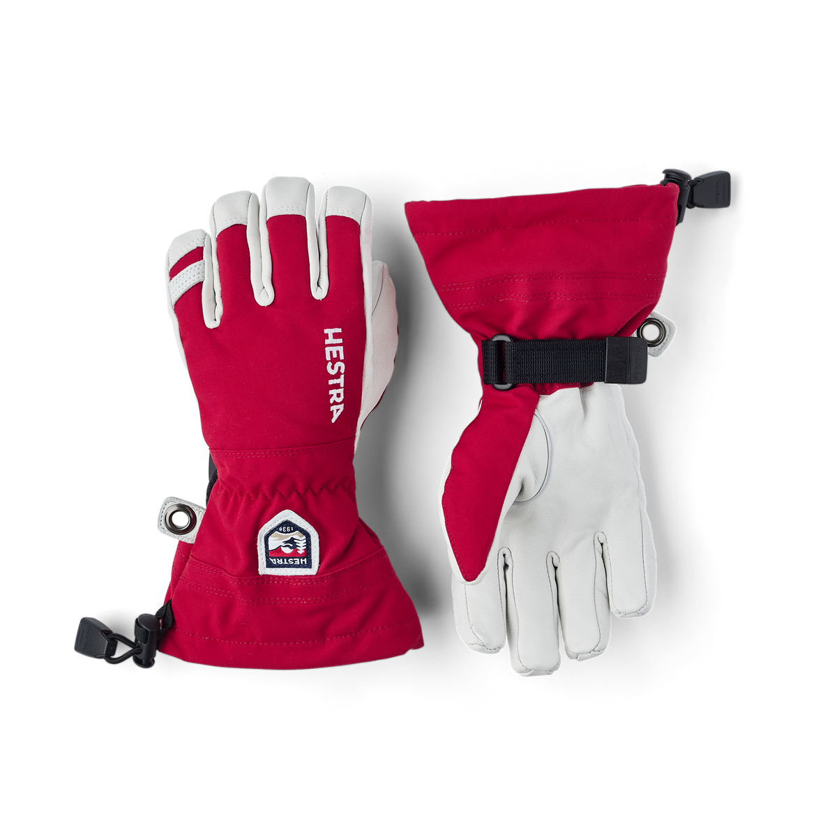 Hestra junior ski gloves set in red with white palms and black adjustable wrist strap