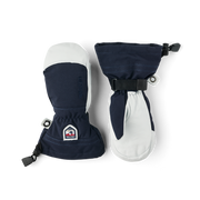 Pair of Hestra junior ski gloves with navy and white panels, wrist straps, and pull tabs