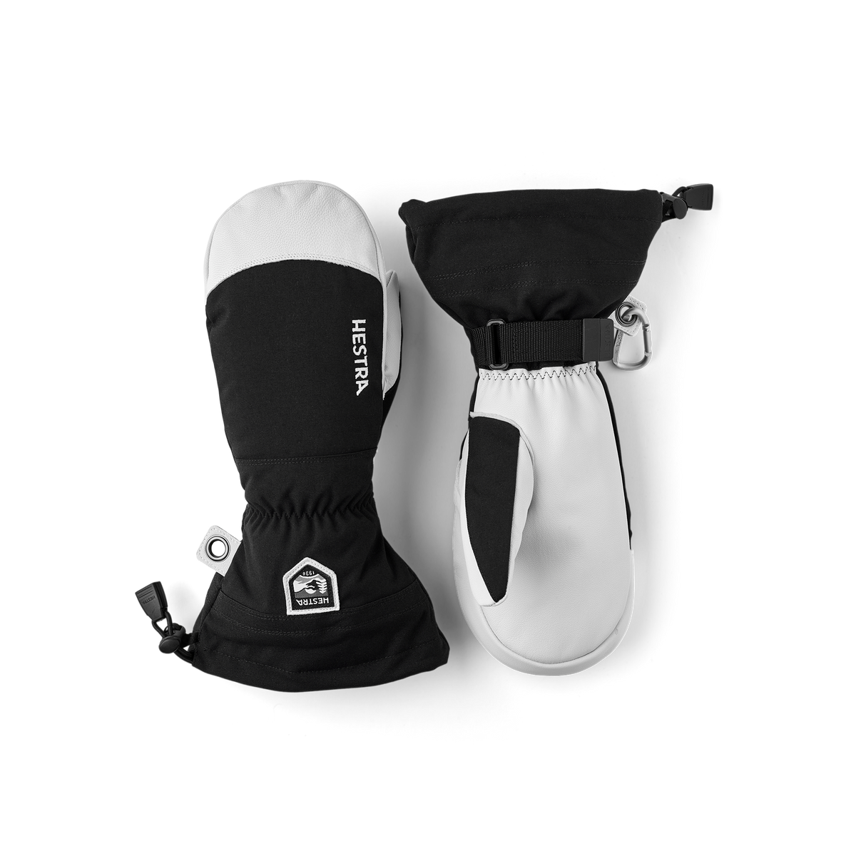 Pair of Hestra ski gloves and mittens in black and white with wrist strap