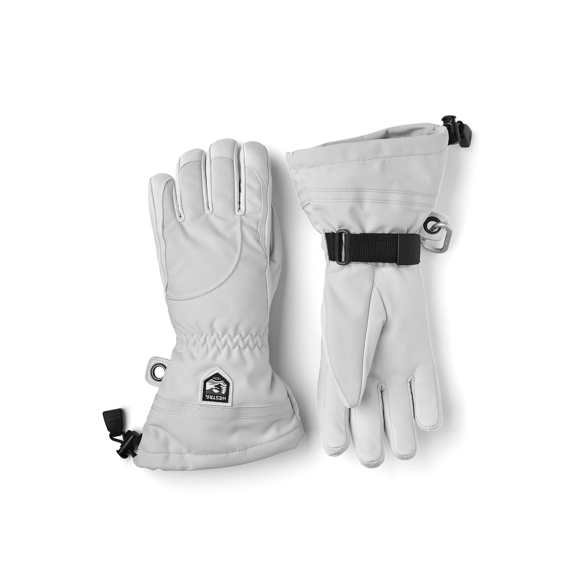 Pair of white insulated ski gloves with adjustable wrist strap and buckles