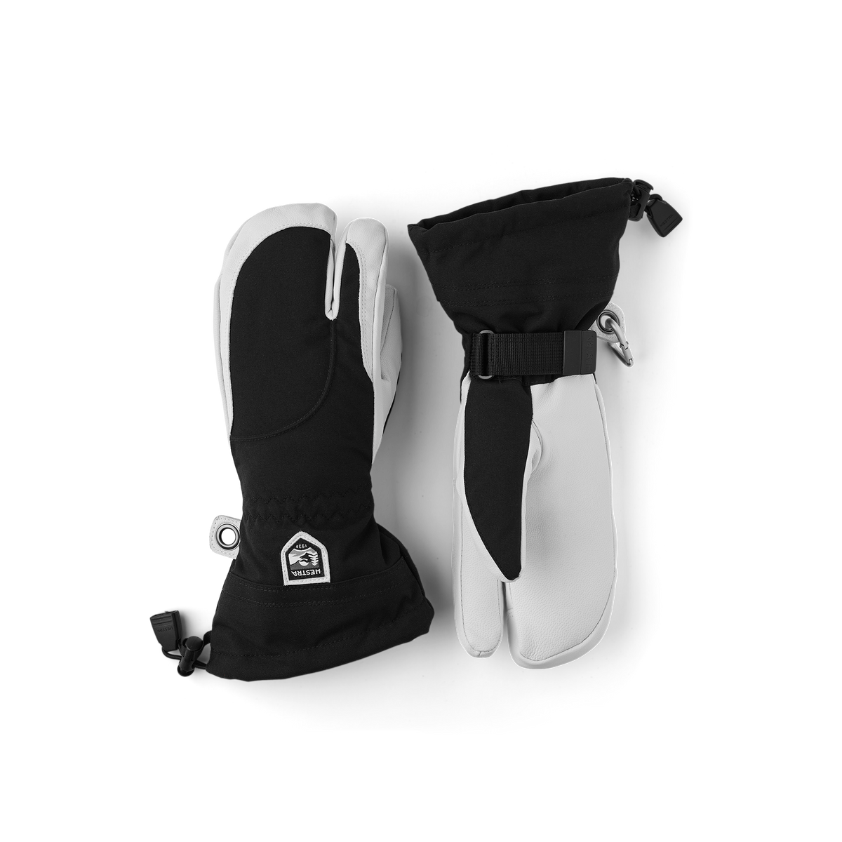Hestra women’s ski gloves in black with off-white panels, adjustable wrist strap