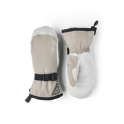 Beige and white powder gauntlet mittens set with black cuff strap and Hestra logo