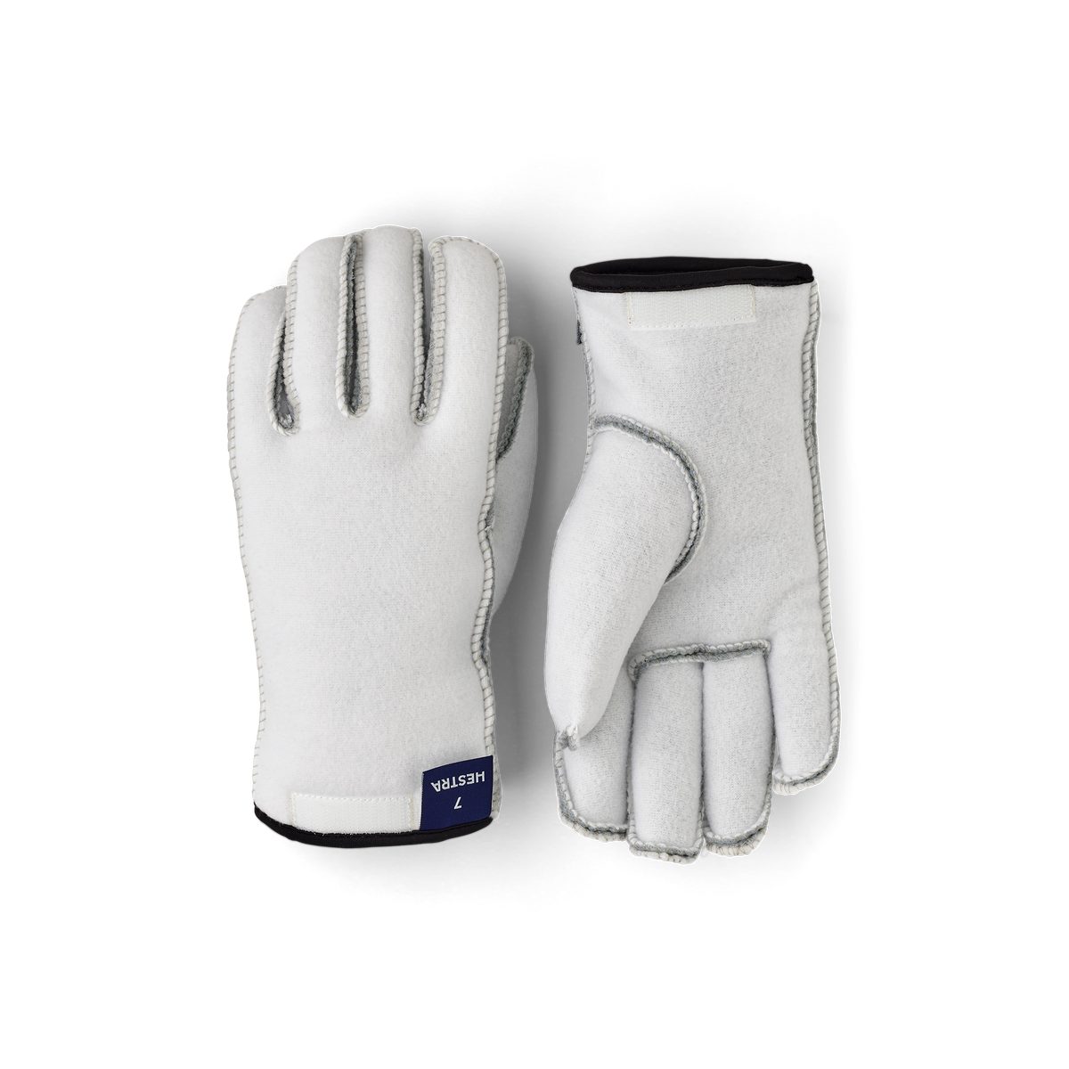 Off-white glove liners with five fingers, gray stitching, and black wrist cuff