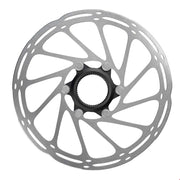 Silver bike disc brake rotor with rounded cutouts and black center lock ring