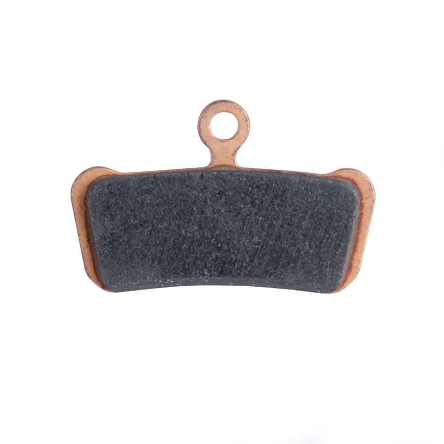 Dark disc brake pad with metal backing and mounting hole for rotor contact